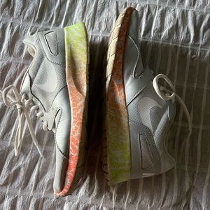 Grey w/ colorful soles Nikes